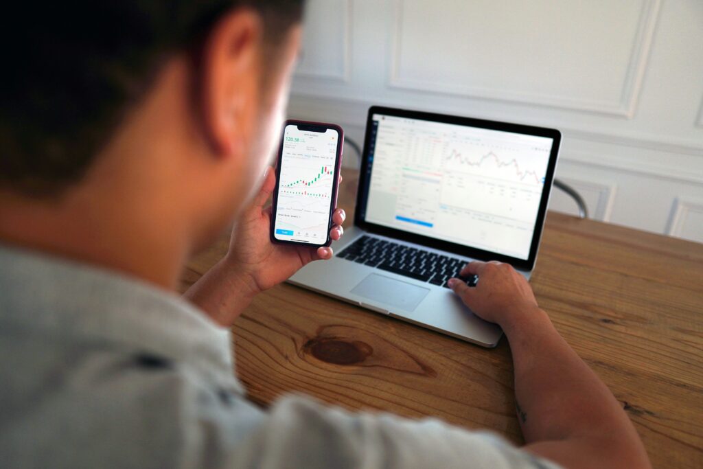 TradeThePool platform displaying stock charts and trading performance metrics.