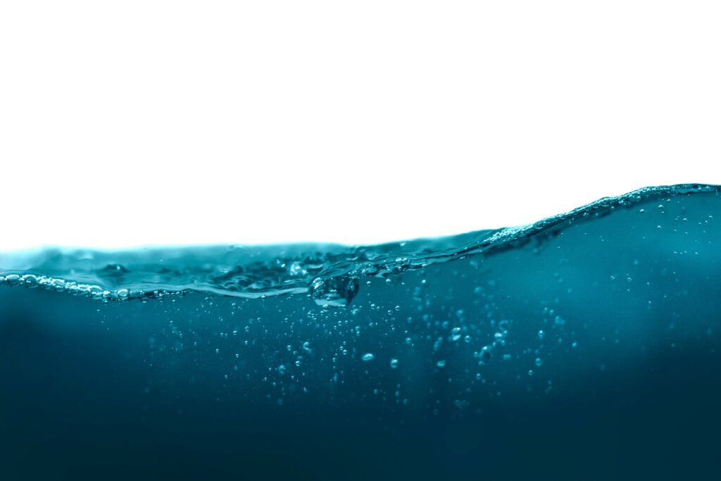 How to Get Water Out of Your Ear: Illustration showing trapped water in the ear canal and safe methods for draining it after swimming or bathing.