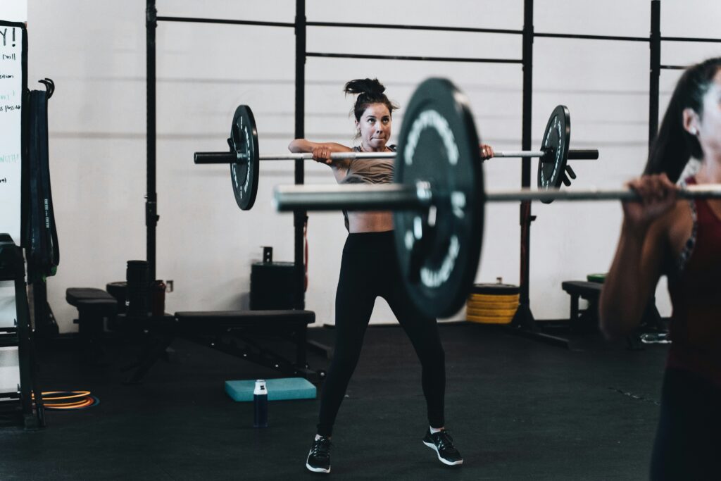 Mayhem Athlete CrossFit Scaling Guide for Pregnant and Postpartum Women PDF covering CrossFit modifications, exercise intensity, movement scaling, recovery, and postpartum training.