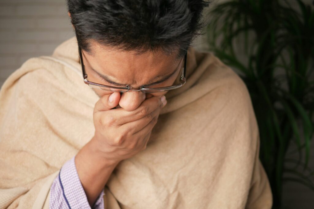 Why Do I Start Coughing When I Lay Down? covering nighttime cough, GERD, postnasal drip, allergies, asthma, irritants, and relief tips.